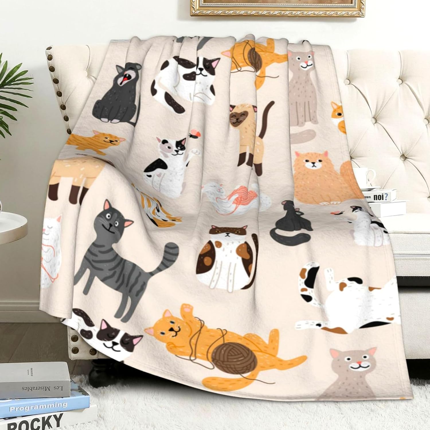 Installing SEGXCFL Cat Blanket Flannel Throw Lightweight All Seasons on a wooden desk
